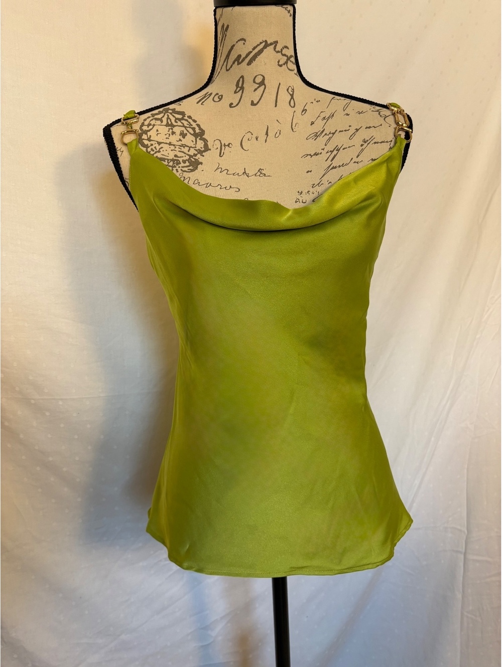 Pretty light olive camisole. Please note damage described.